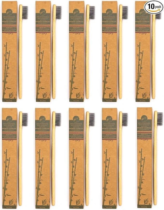 Packaging of bamboo toothbrushes with visible branding on a white background